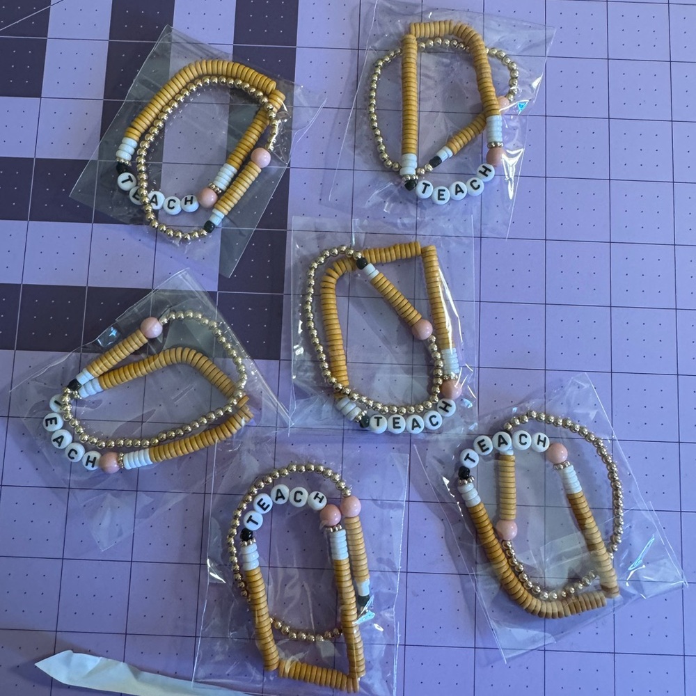 Six Sets of Plunder Designs Yellow Pencil Beaded Bracelets with Teach Charm
